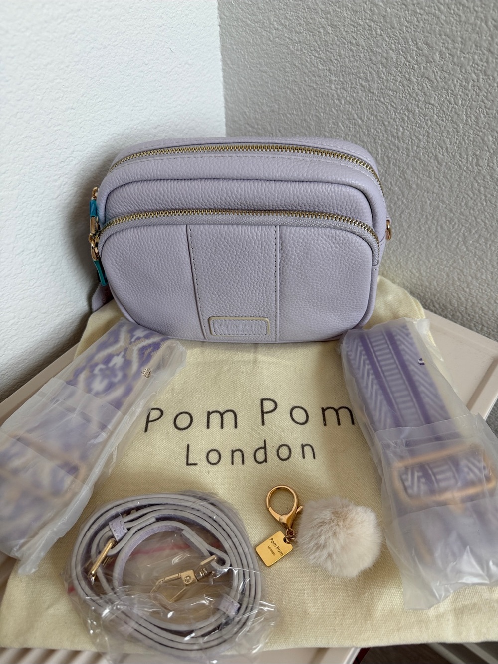 NWT ORIGINAL Pom Pom London Lilac Mayfair Crossbody Bag .